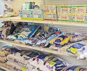 Shelves of bagged bird seed